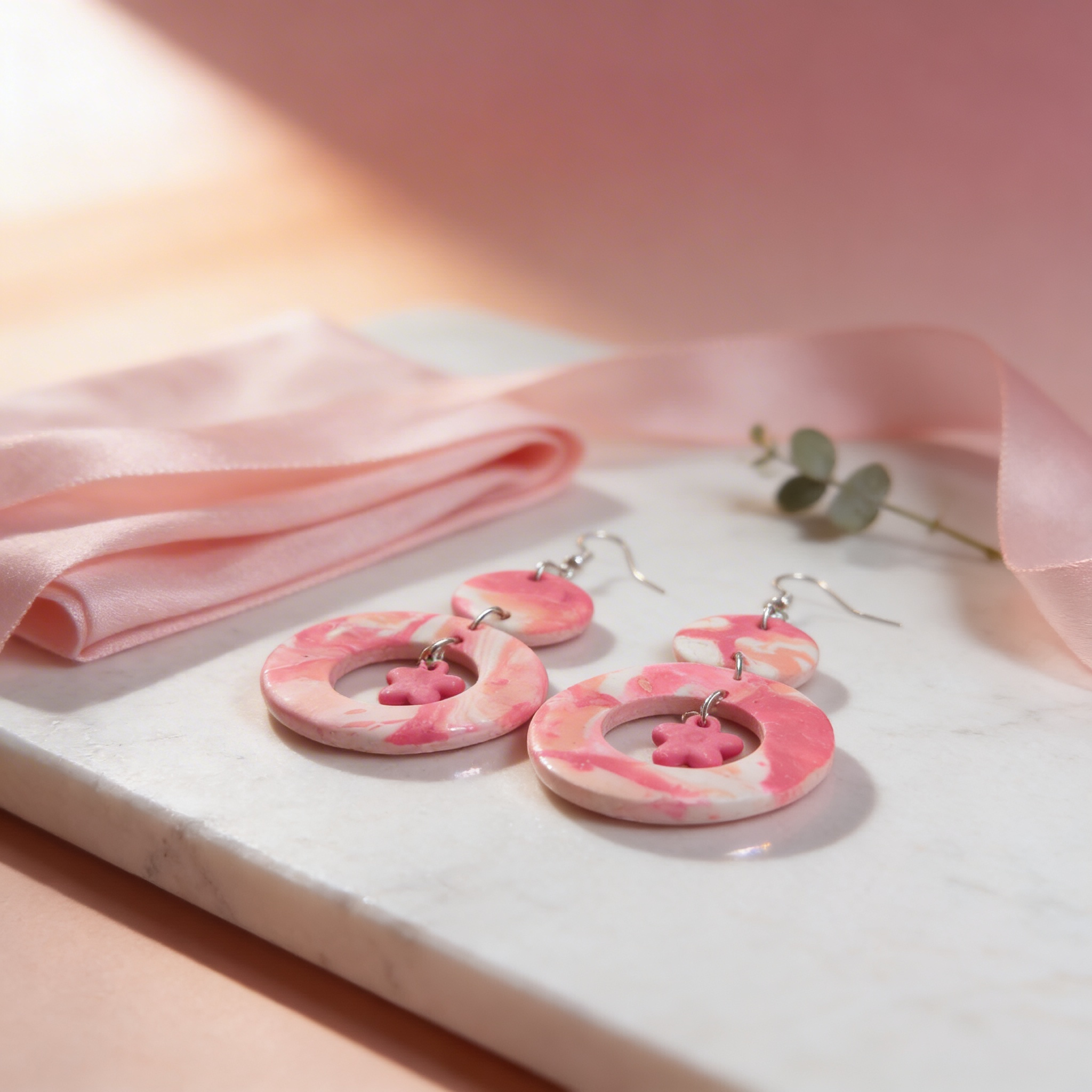 Pink blossom swirl statement earrings